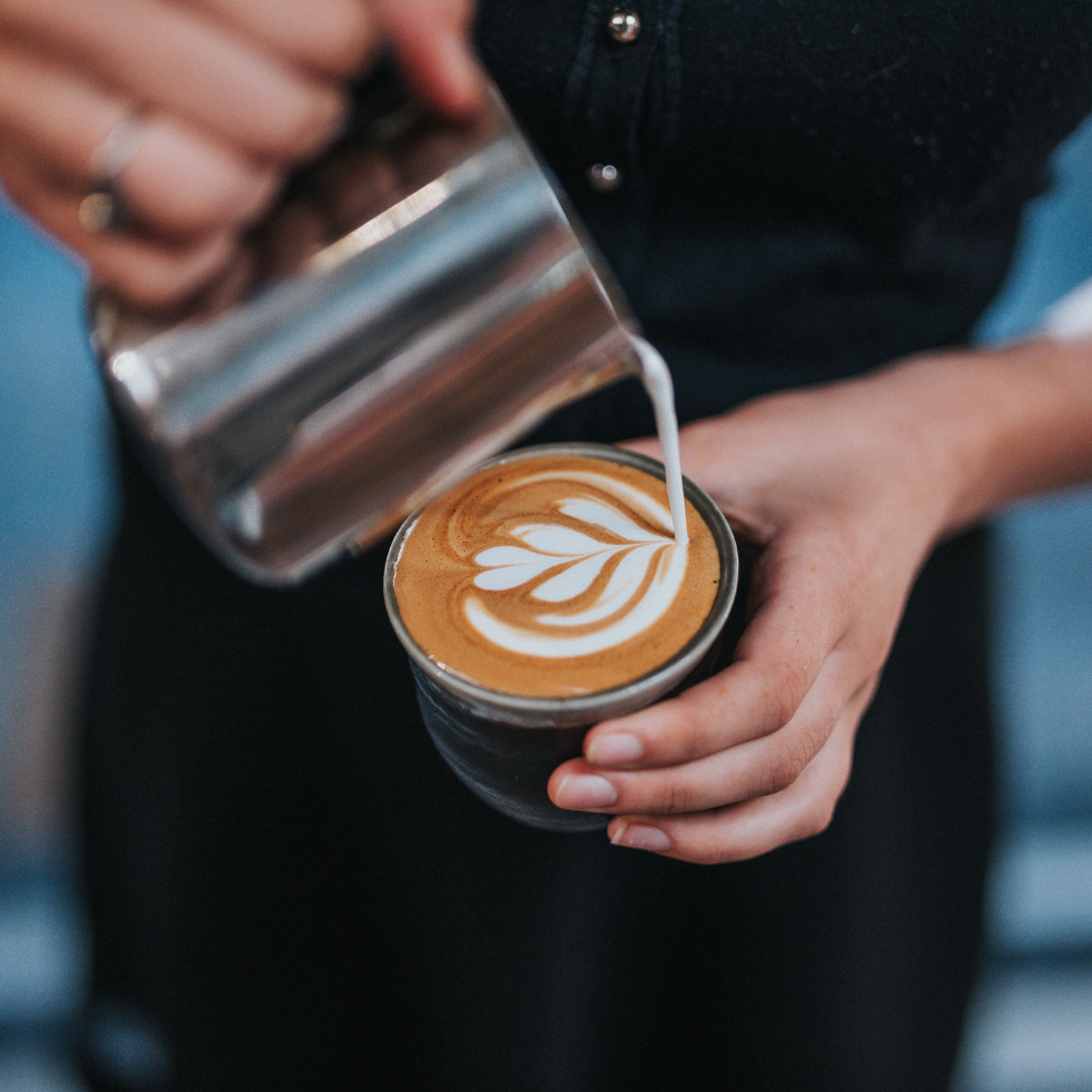 barista making latte art