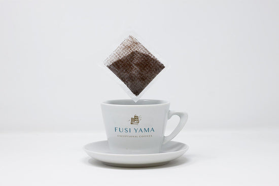 FUSI YAMA branded cup with Coffee Bag above